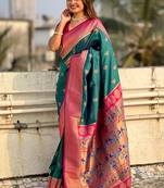 Teal green woven self design pure silk paithani saree with blouse