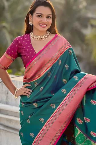 Teal green woven self design pure silk paithani saree with blouse