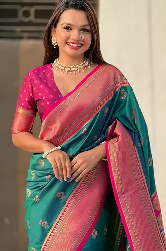 Teal green woven self design pure silk paithani saree with blouse