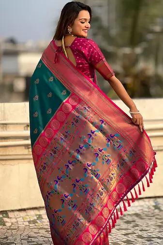 Teal green woven self design pure silk paithani saree with blouse