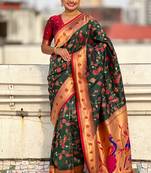 Dark green woven self design pure silk paithani saree with blouse