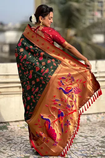Dark green woven self design pure silk paithani saree with blouse