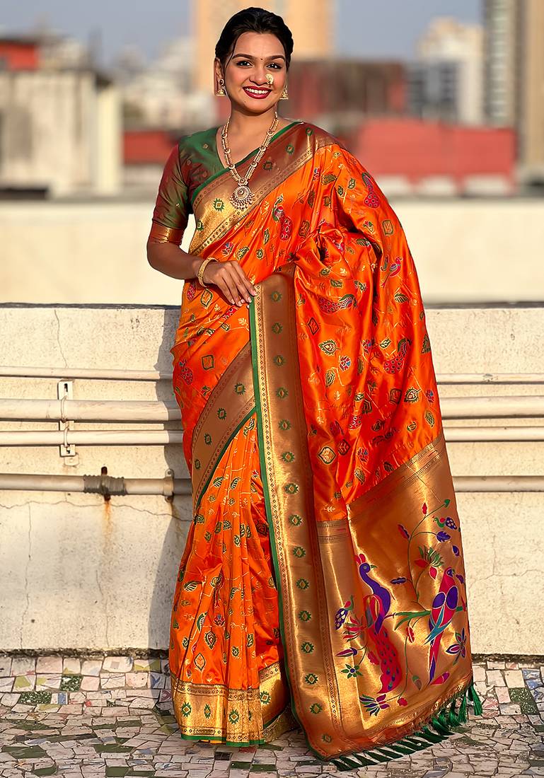 Orange woven self design pure silk paithani saree with blouse