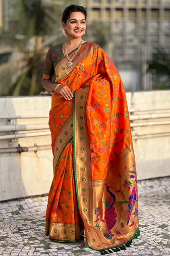 Orange woven self design pure silk paithani saree with blouse