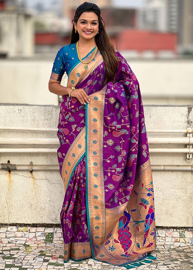 Purple woven self design pure silk paithani saree with blouse