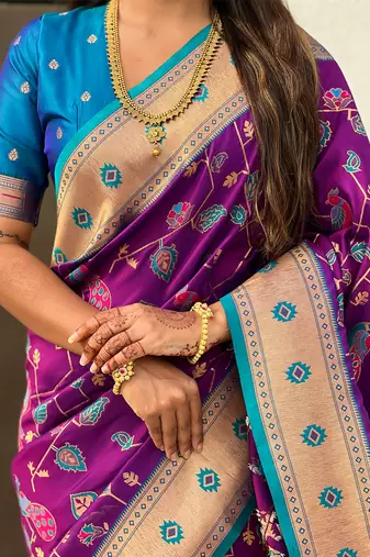 Purple woven self design pure silk paithani saree with blouse