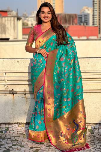 Sea green woven self design pure silk paithani saree with blouse