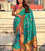 Sea green woven self design pure silk paithani saree with blouse