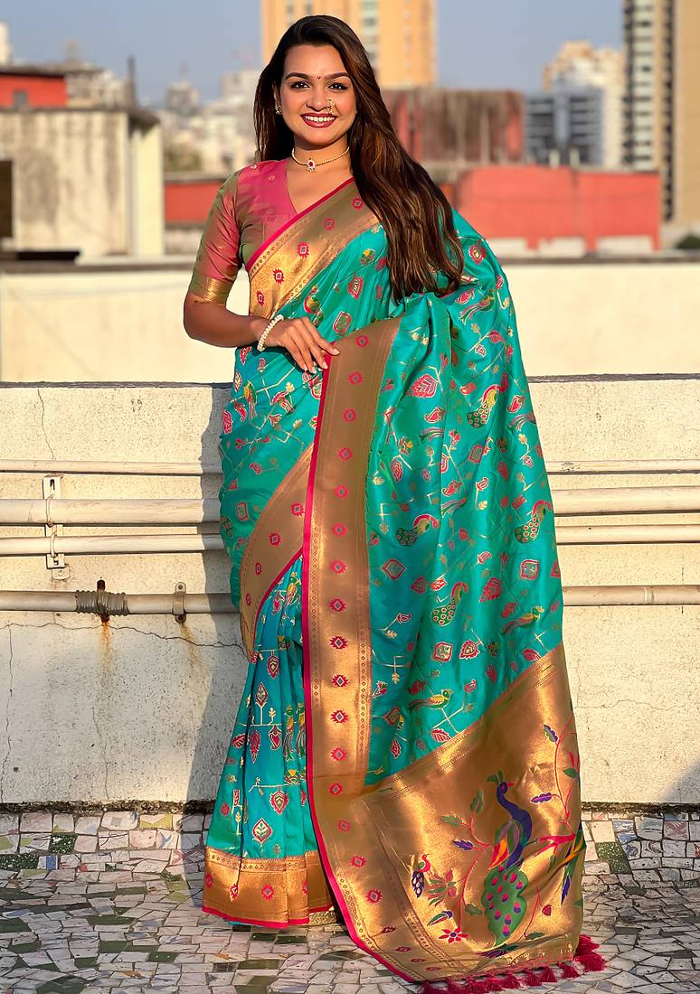 Sea green woven self design pure silk paithani saree with blouse
