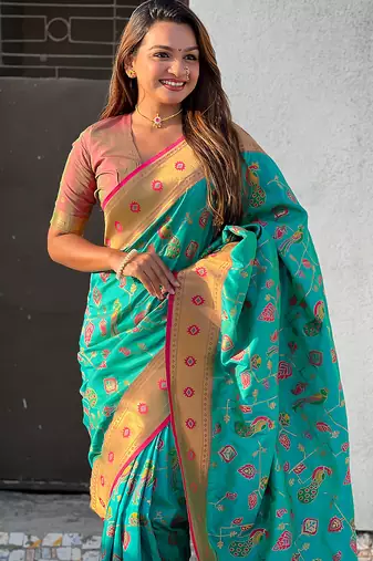 Sea green woven self design pure silk paithani saree with blouse