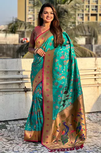 Sea green woven self design pure silk paithani saree with blouse
