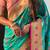 Sea green woven self design pure silk paithani saree with blouse