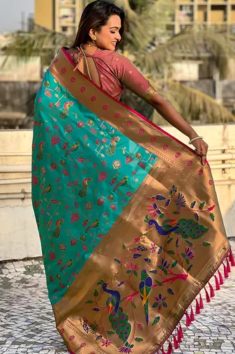 Sea green woven self design pure silk paithani saree with blouse