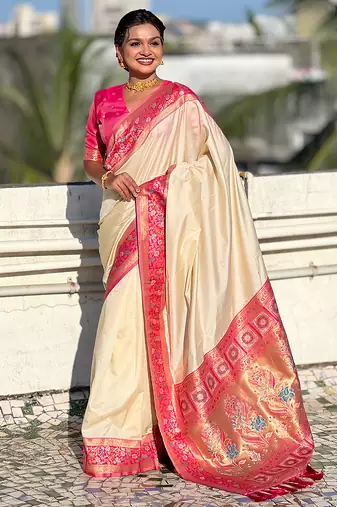 Cream woven self design pure silk paithani saree with blouse