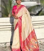 Cream woven self design pure silk paithani saree with blouse