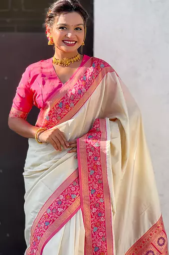 Cream woven self design pure silk paithani saree with blouse