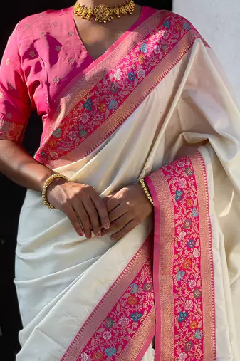 Cream woven self design pure silk paithani saree with blouse