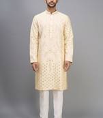 men’s yellow silk kurta pant set with intricate embroidery