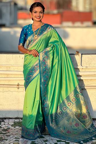 Pista green woven self design pure silk paithani saree with blouse