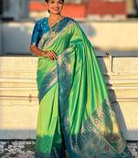 Pista green woven self design pure silk paithani saree with blouse