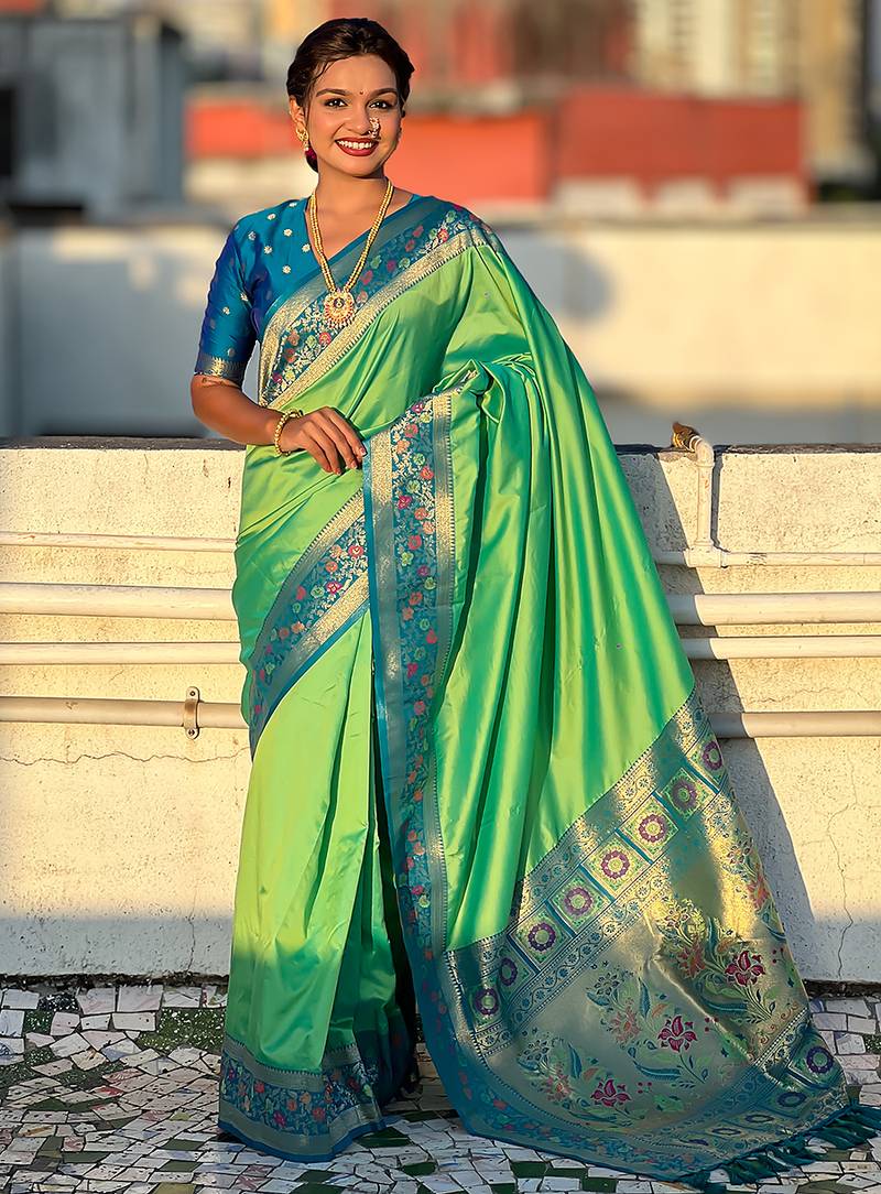 Pista green woven self design pure silk paithani saree with blouse