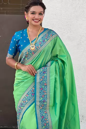 Pista green woven self design pure silk paithani saree with blouse