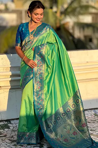 Pista green woven self design pure silk paithani saree with blouse