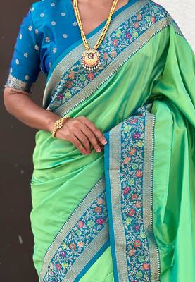 Pista green woven self design pure silk paithani saree with blouse 4