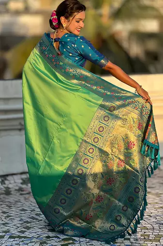 Pista green woven self design pure silk paithani saree with blouse
