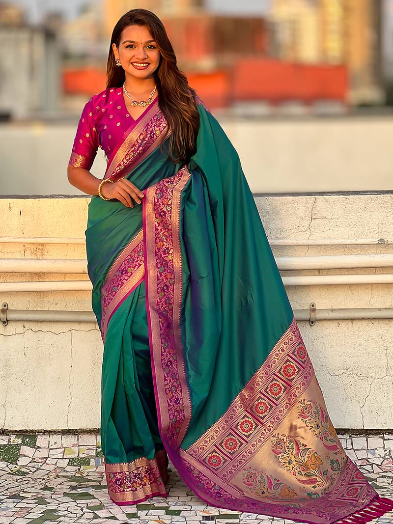 Teal green woven self design pure silk paithani saree with blouse