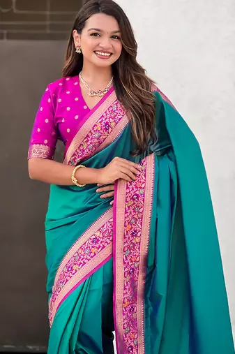 Teal green woven self design pure silk paithani saree with blouse