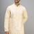 men’s yellow silk kurta pant set with intricate embroidery