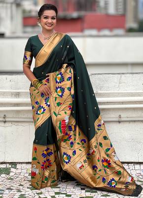 Dark green woven self design pure silk paithani saree with blouse 1