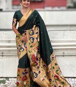 Dark green woven self design pure silk paithani saree with blouse