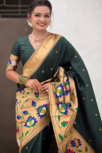 Dark green woven self design pure silk paithani saree with blouse