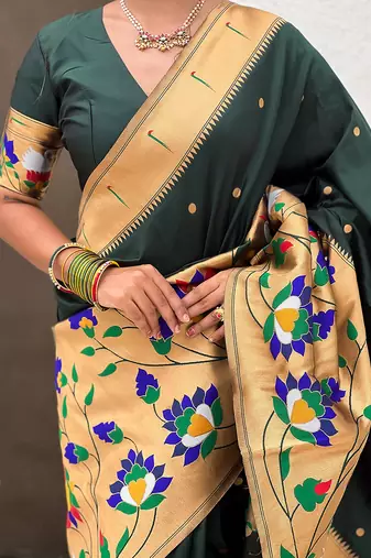 Dark green woven self design pure silk paithani saree with blouse