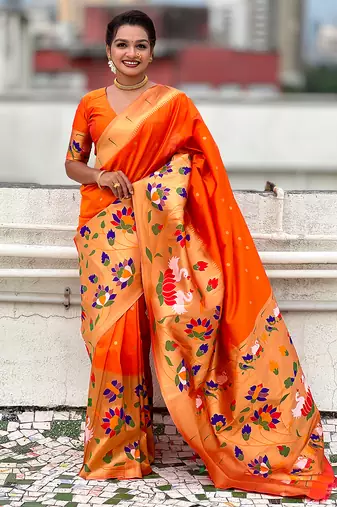 Orange woven self design pure silk paithani saree with blouse