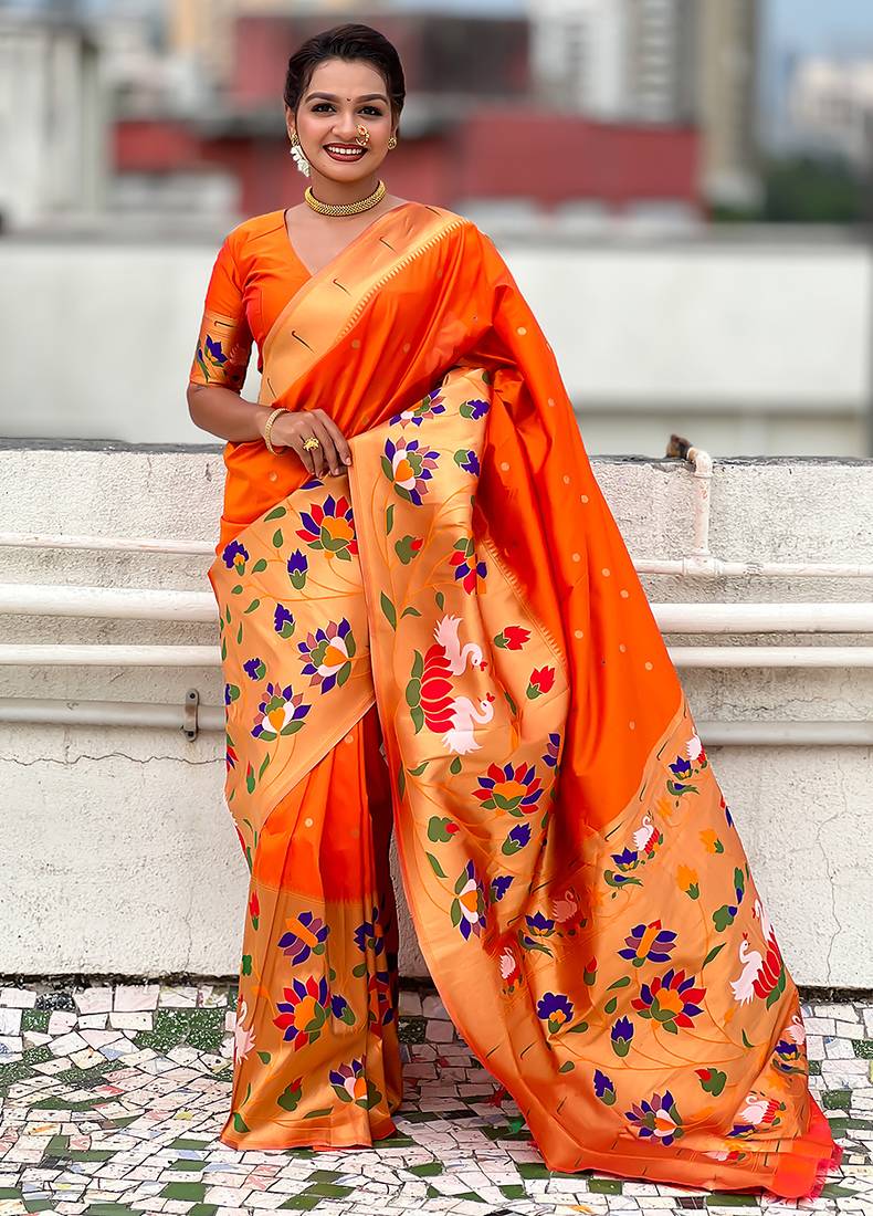 Orange woven self design pure silk paithani saree with blouse