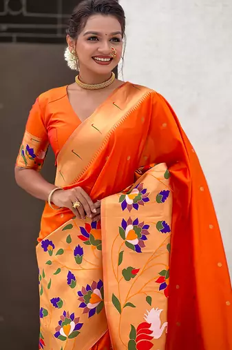 Orange woven self design pure silk paithani saree with blouse