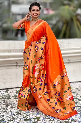 Orange woven self design pure silk paithani saree with blouse