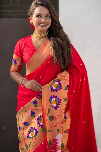 Red woven self design pure silk paithani saree with blouse