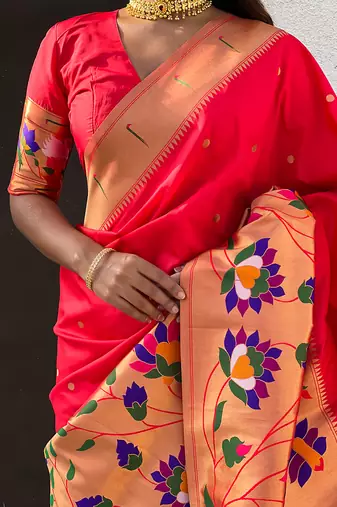 Red woven self design pure silk paithani saree with blouse