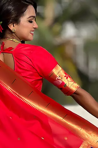 Red woven self design pure silk paithani saree with blouse