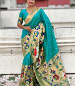 Sea green woven self design pure silk paithani saree with blouse