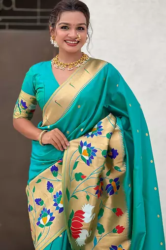 Sea green woven self design pure silk paithani saree with blouse
