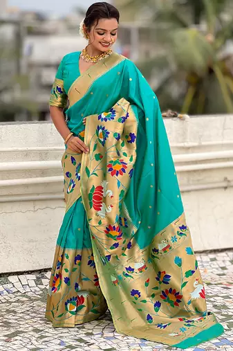 Sea green woven self design pure silk paithani saree with blouse