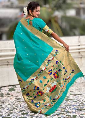 Sea green woven self design pure silk paithani saree with blouse 5