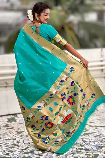 Sea green woven self design pure silk paithani saree with blouse