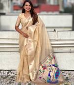Beige woven self design organza paithani saree with blouse