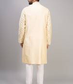 men’s cream silk kurta set with pink floral embroidery